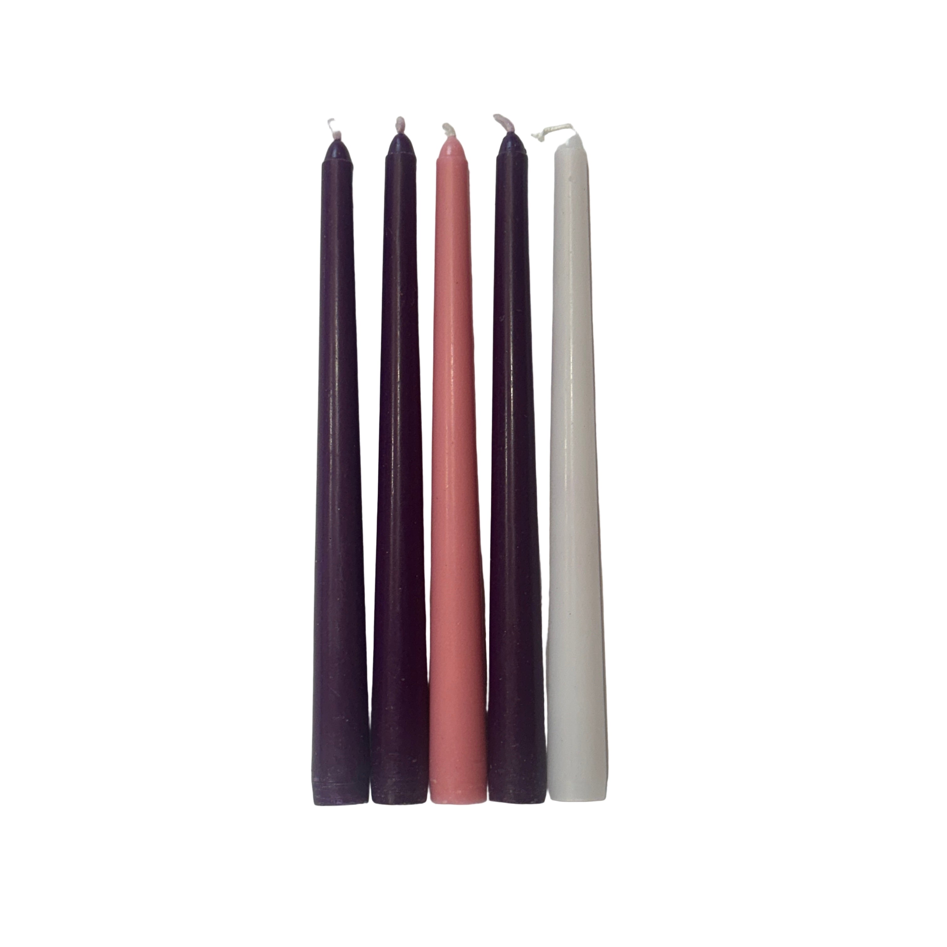 Five advent colored taper candles in purple, pink and white arranged on a white background